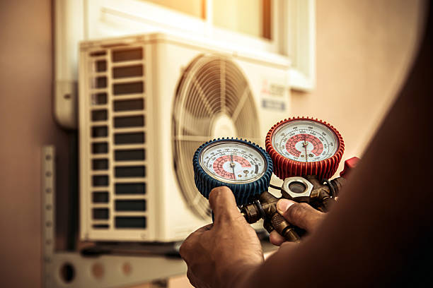 Professional Hvac technician working in New Douglas, IL